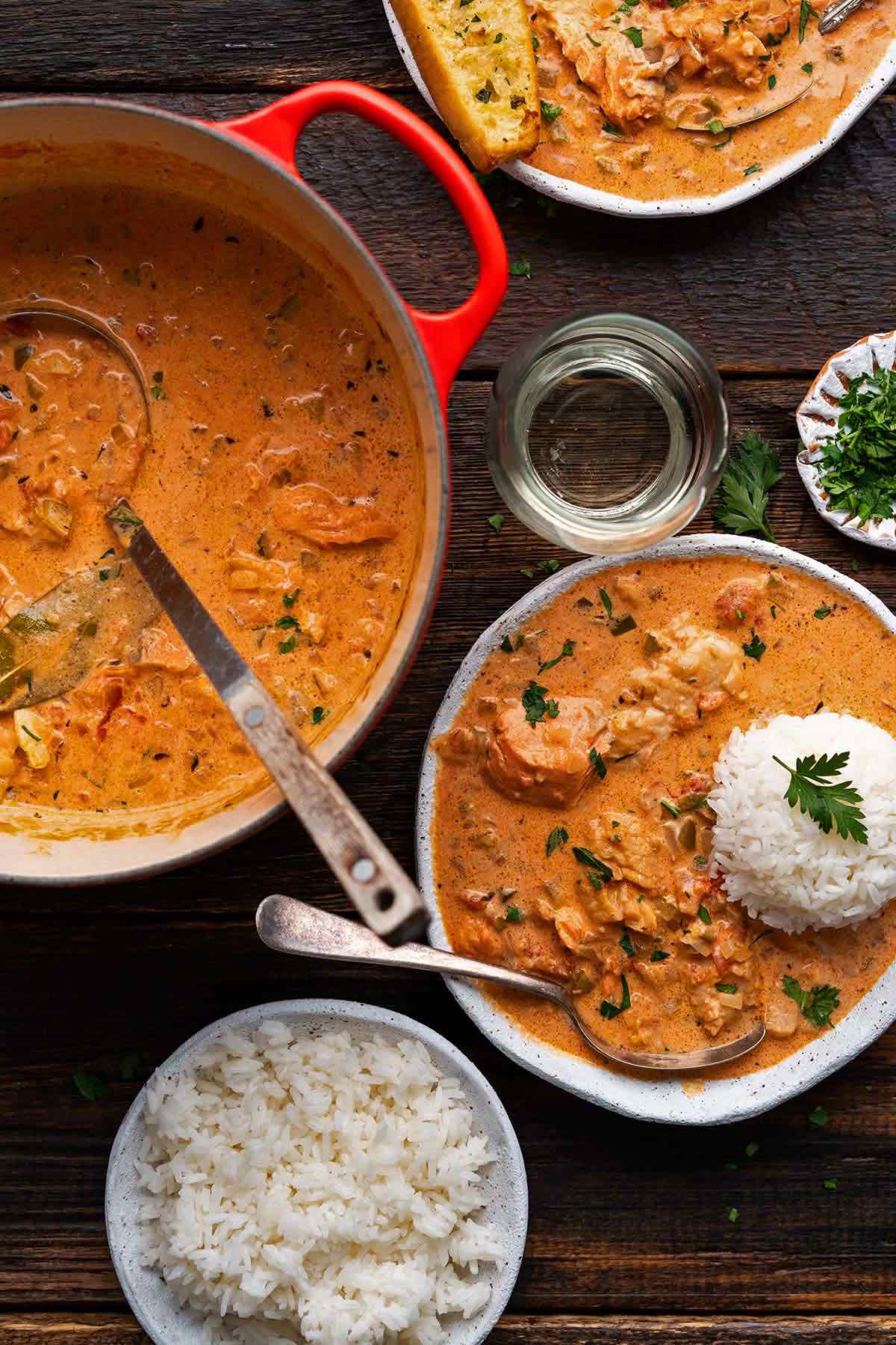 overhead view of seafood pan roast meal with steamed rice