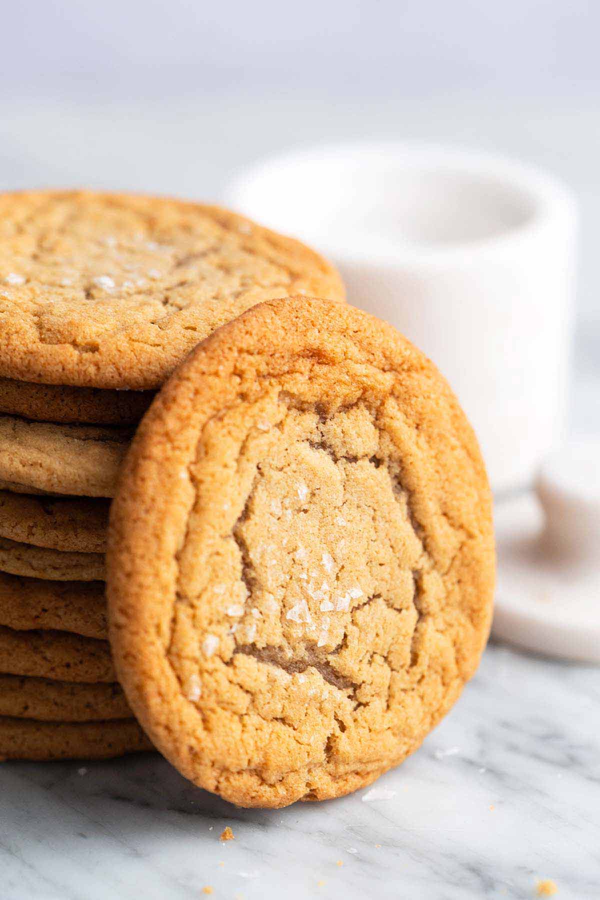 stack of boneless chocolate chip cookies with one in front