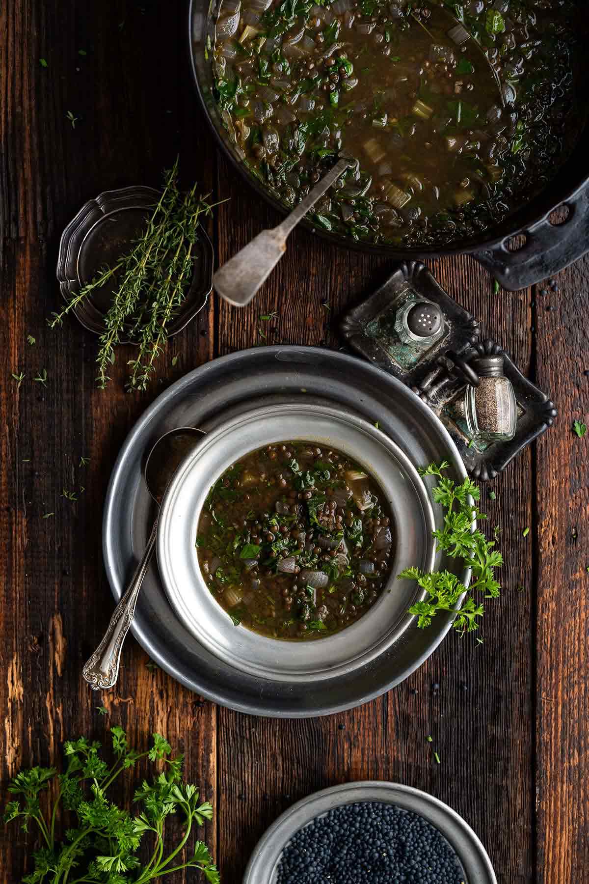 overhead view of witches brew halloween stew with lentils and spinach