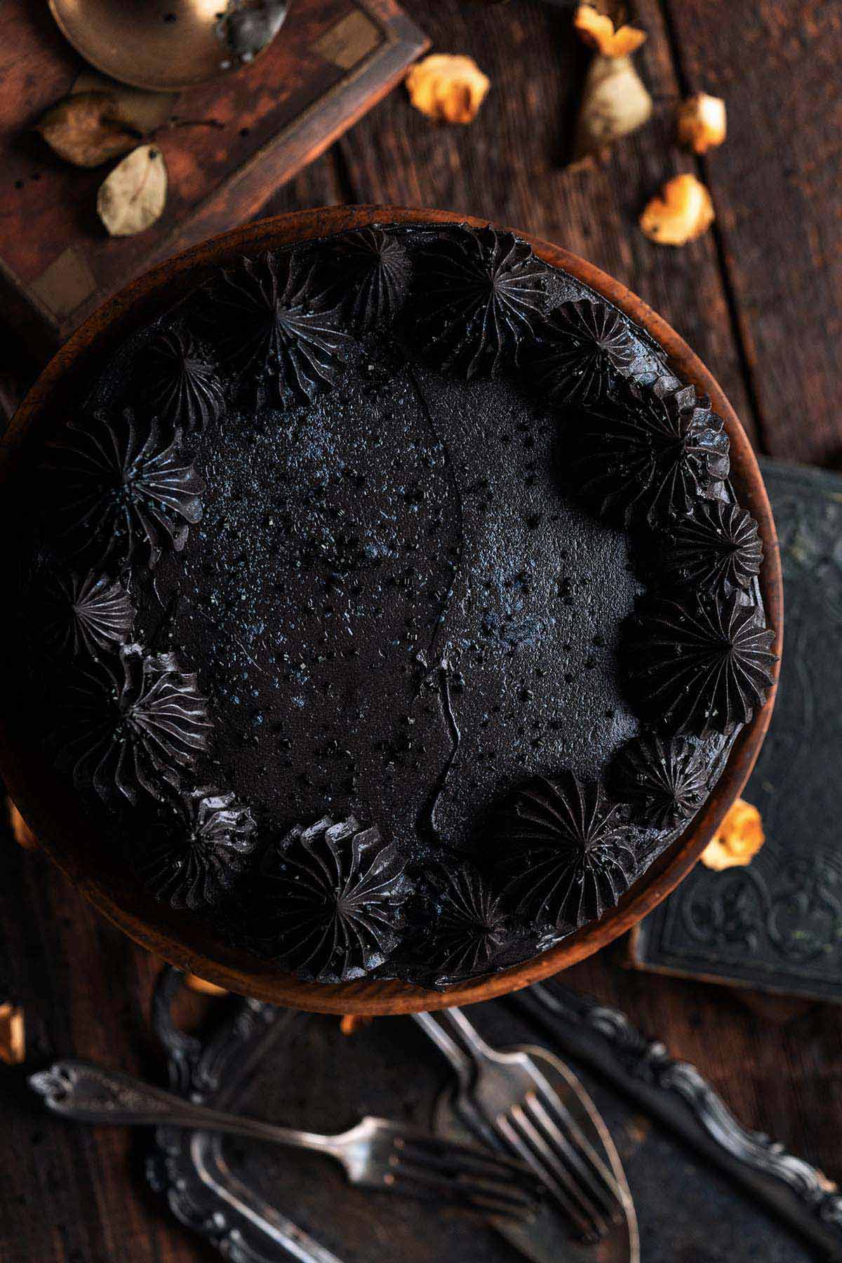 top view of black cocoa halloween cake with black cocoa buttercream