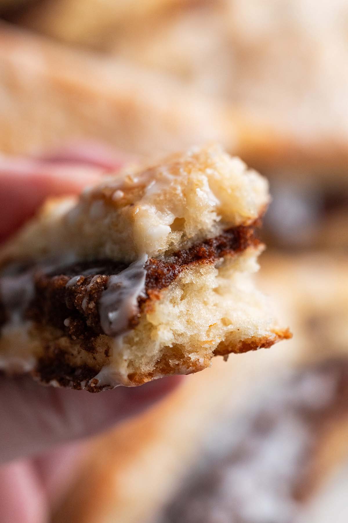 bite of flaky sourdough scone to show tender interior