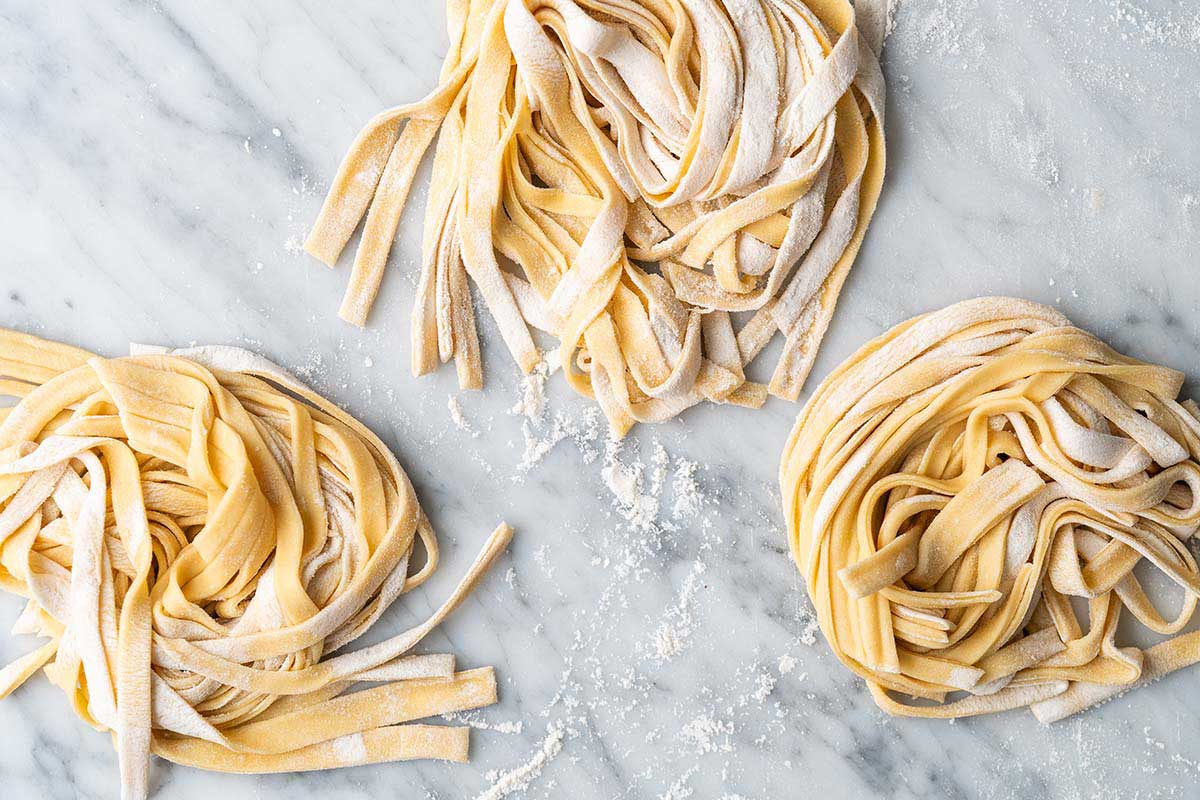sourdough pasta nests on marble counter