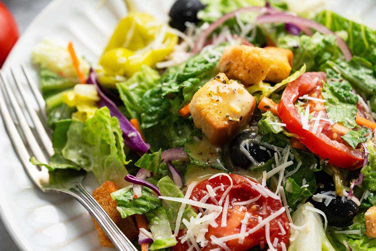 close up of plate of fresh romaine salad