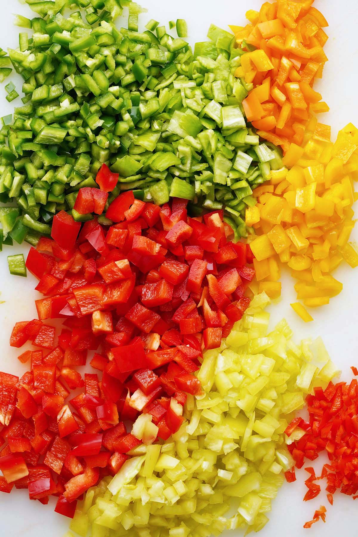variety of chopped sweet and hot peppers for making relish