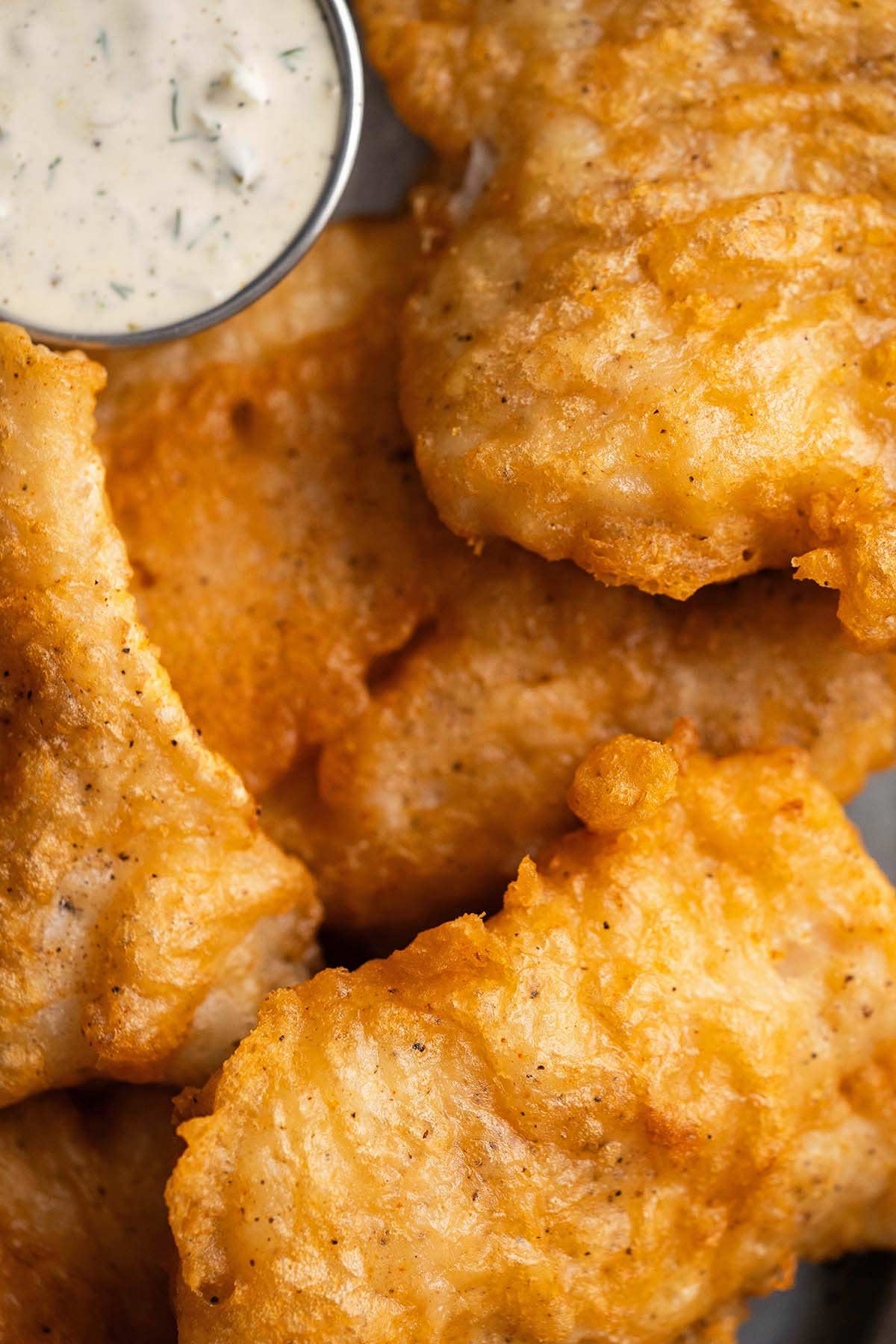 crispy golden beer batter fried fish with tartar sauce