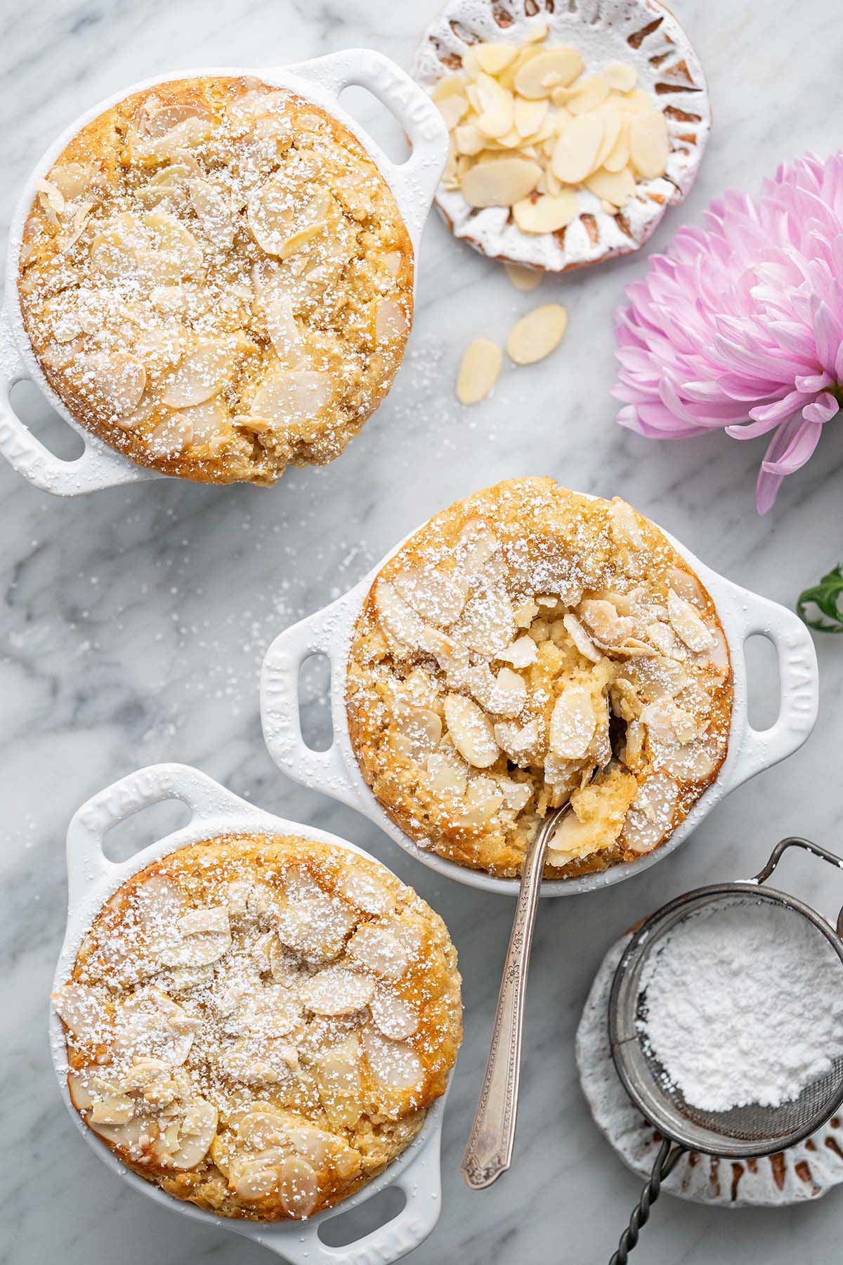 meal prep protein baked oatmeal in staub individual ramekins on marble countertop