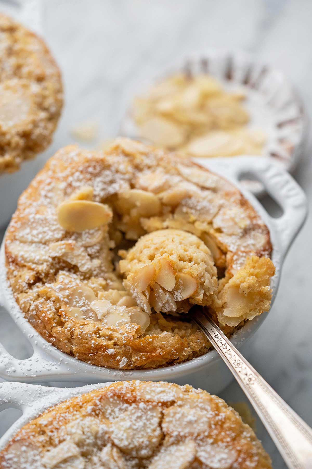 protein baked oatmeal with bite on spoon to show fluffy cake texture