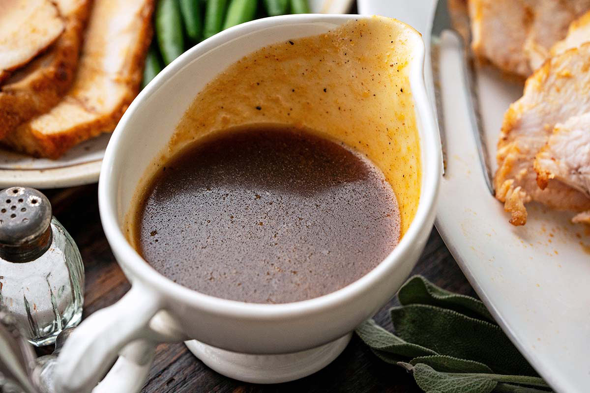 sweet and savory maple bourbon glaze next to turkey