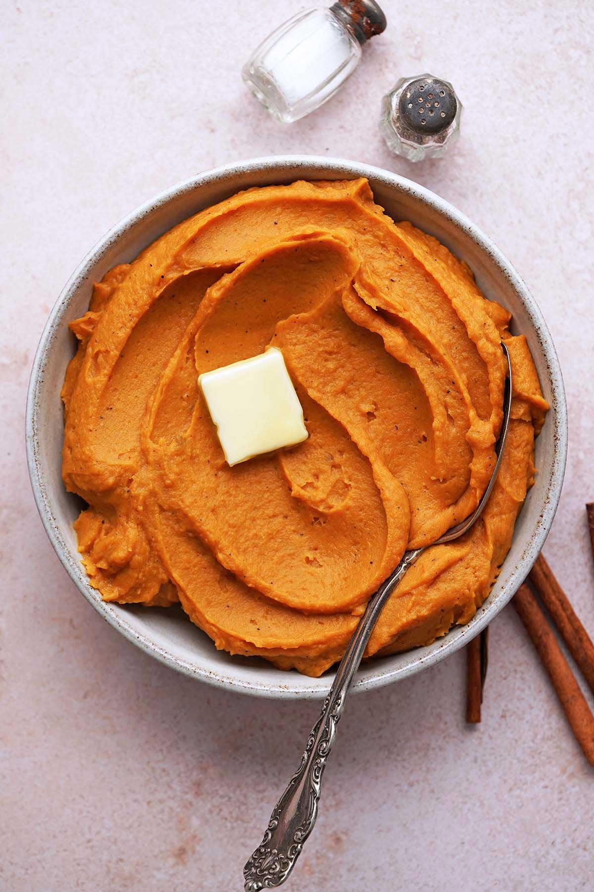 whipped sweet potatoes in stoneware bowl