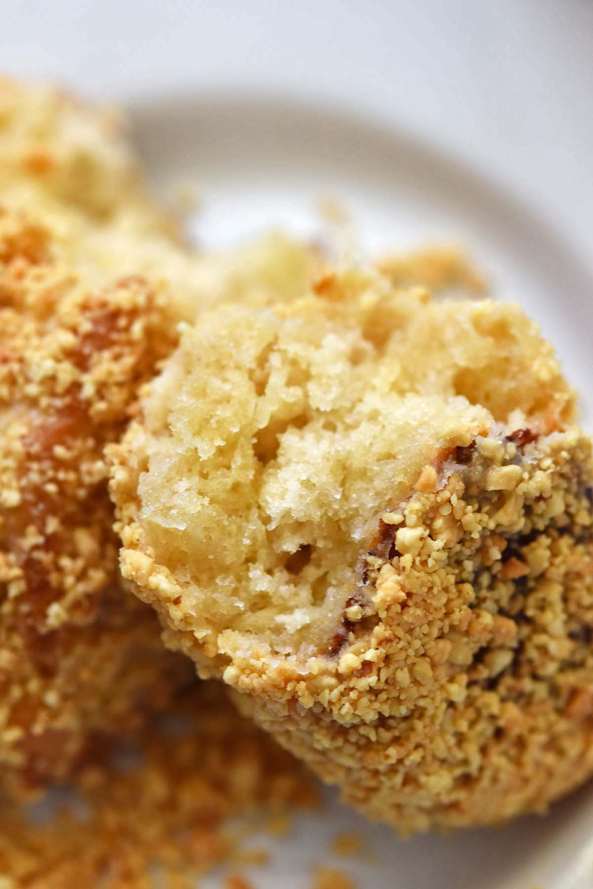 close up of sourdough baked peanut stick donuts showing fluffy texture