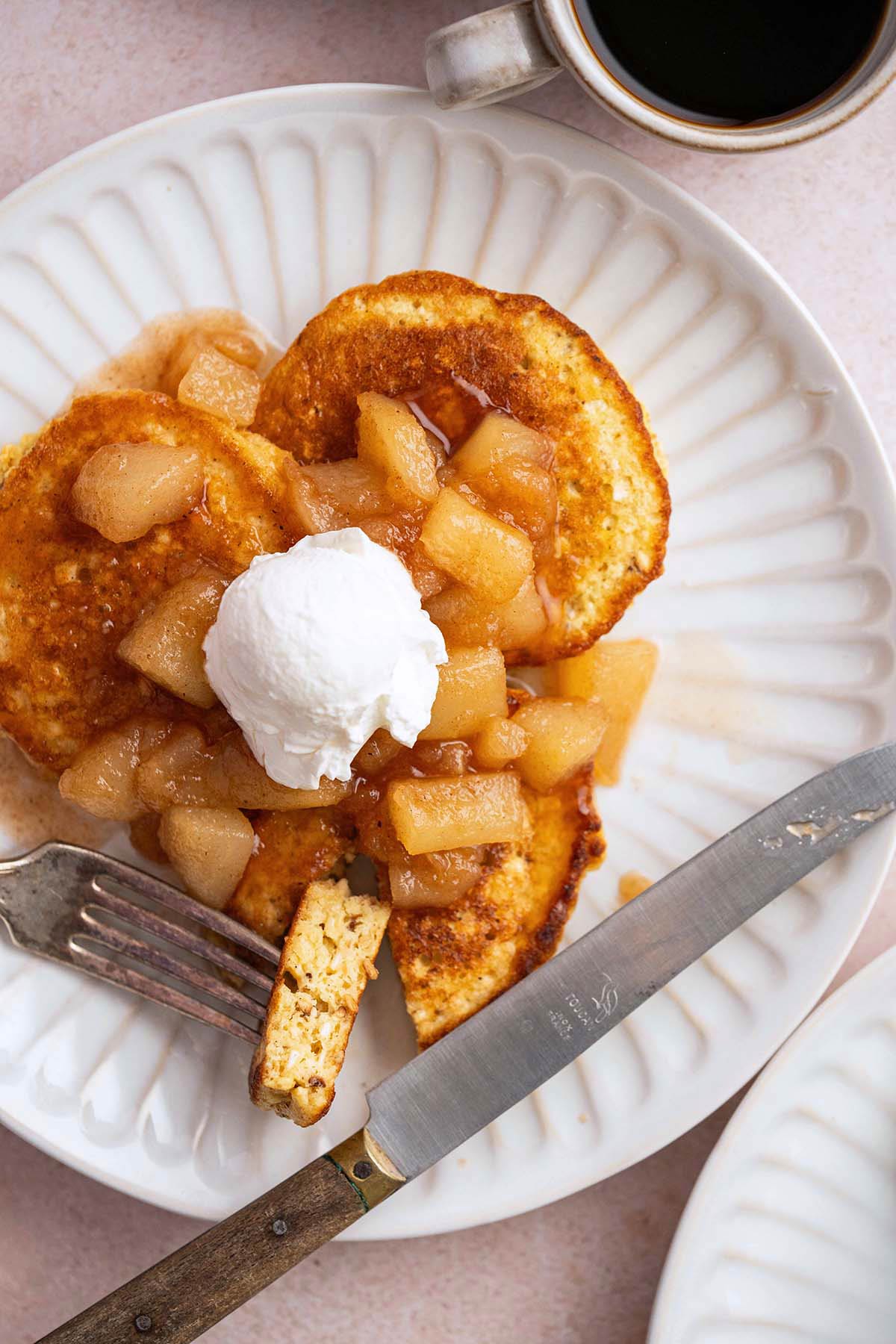 close up top view of plate of matzo meal pancakes showing fluffy texture