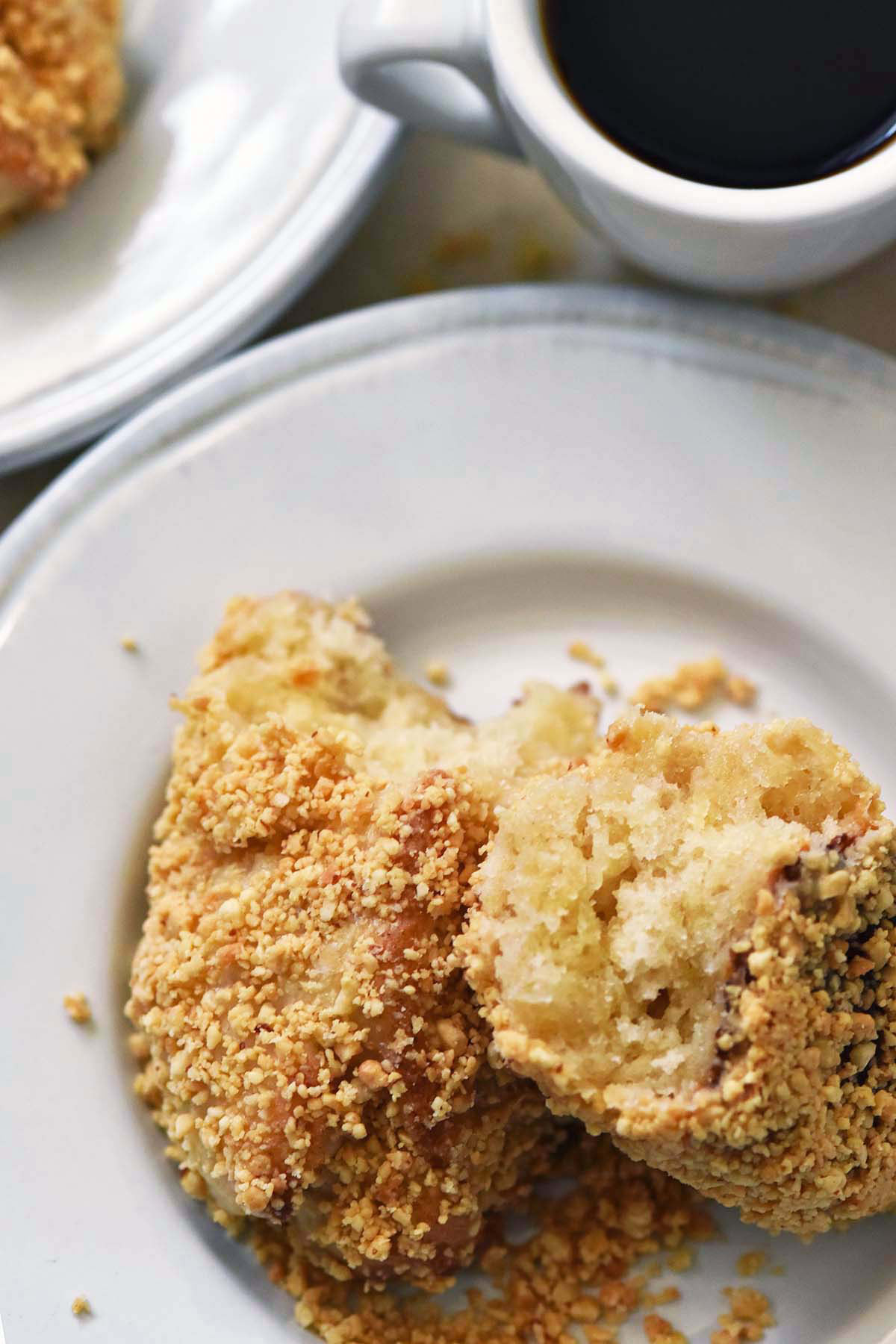 homemade buffalo peanut sticks on plate with cup of coffee