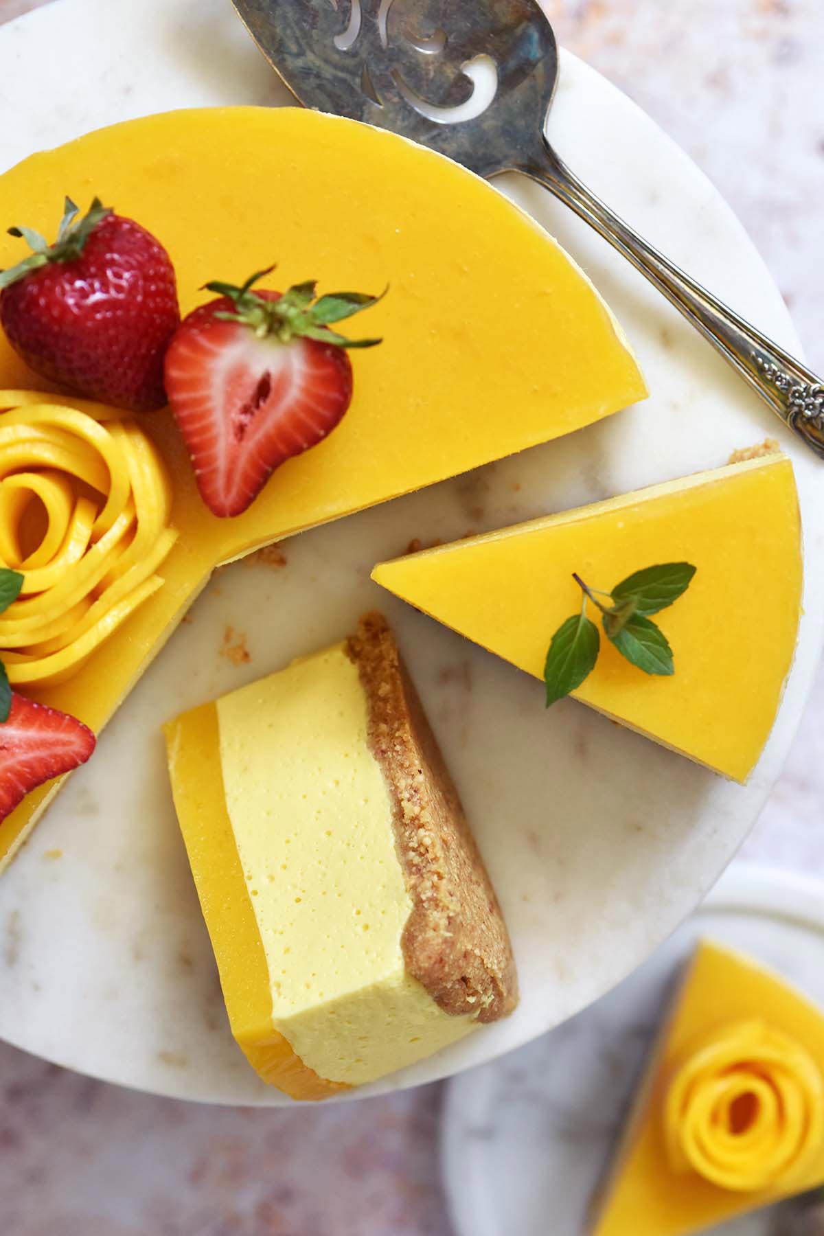top view of no bake cheesecake slices with mango jelly topping