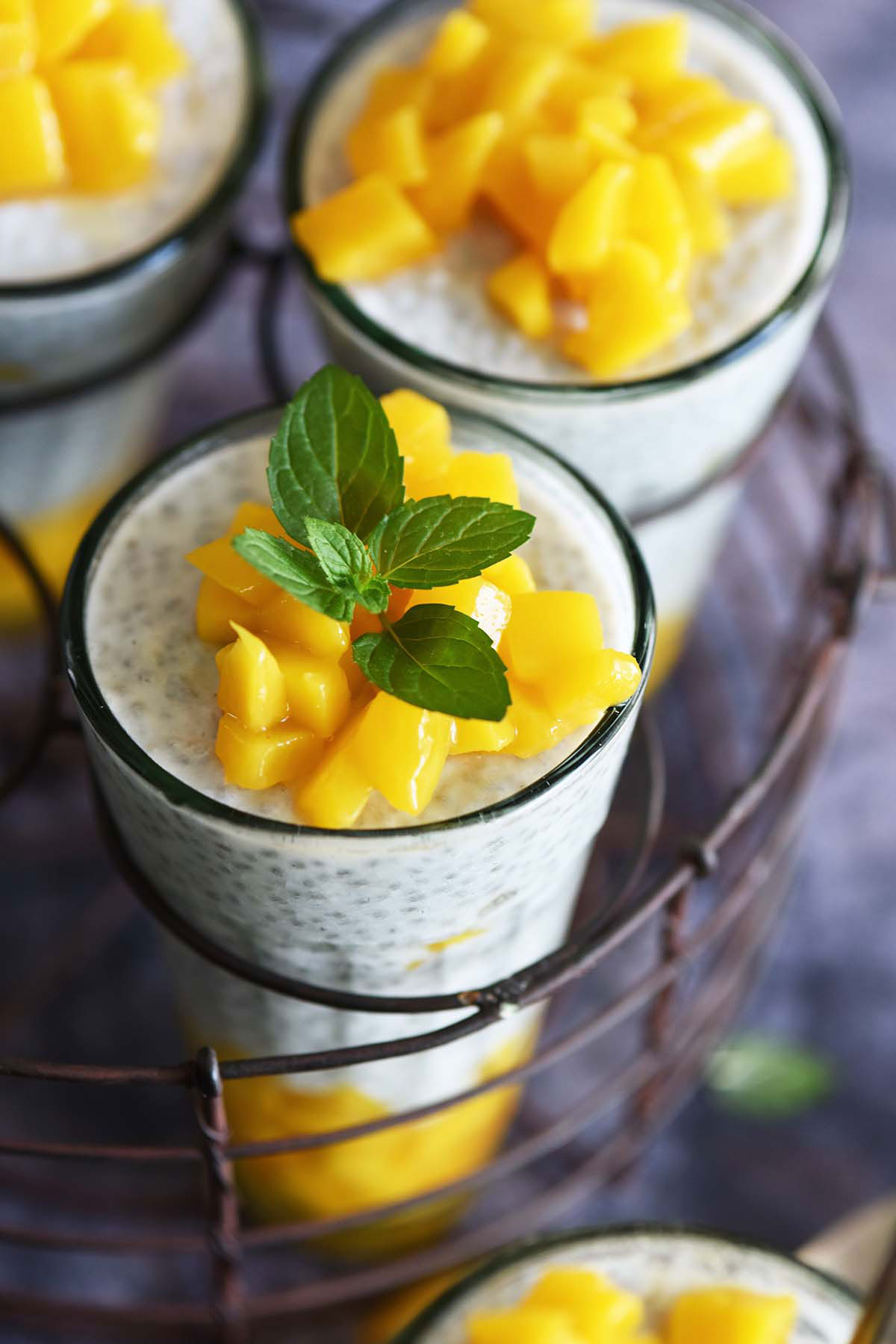 front view of chia seed pudding with mango and mint