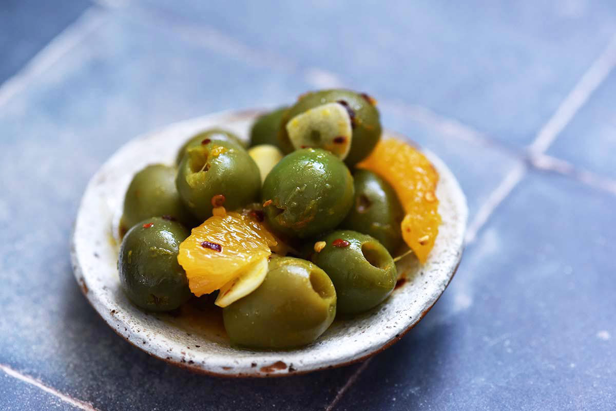 marinated castelvetrano olives with oranges and garlic and honey