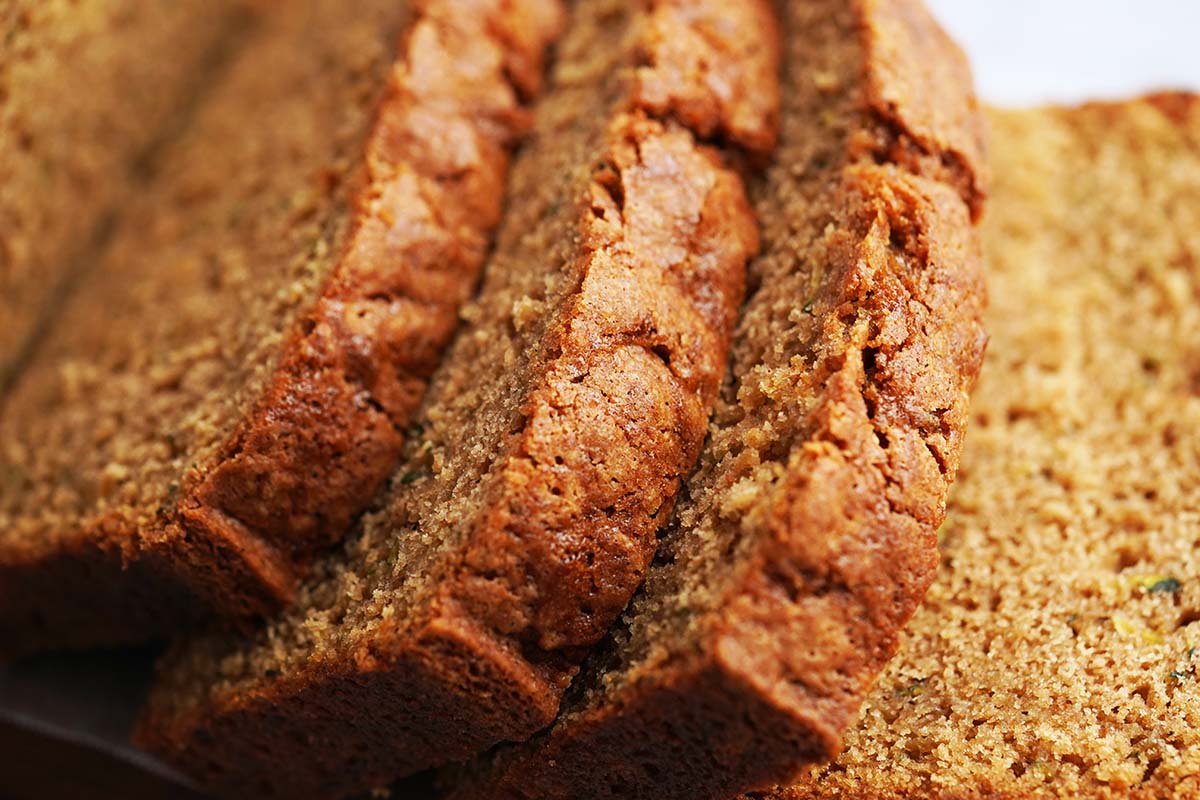 close up of sourdough zucchini bread showing moist tender texture