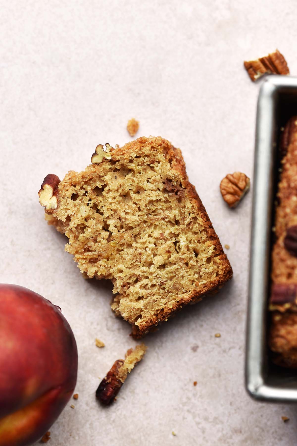 half a slice of sourdough discard quick bread with fresh peaches