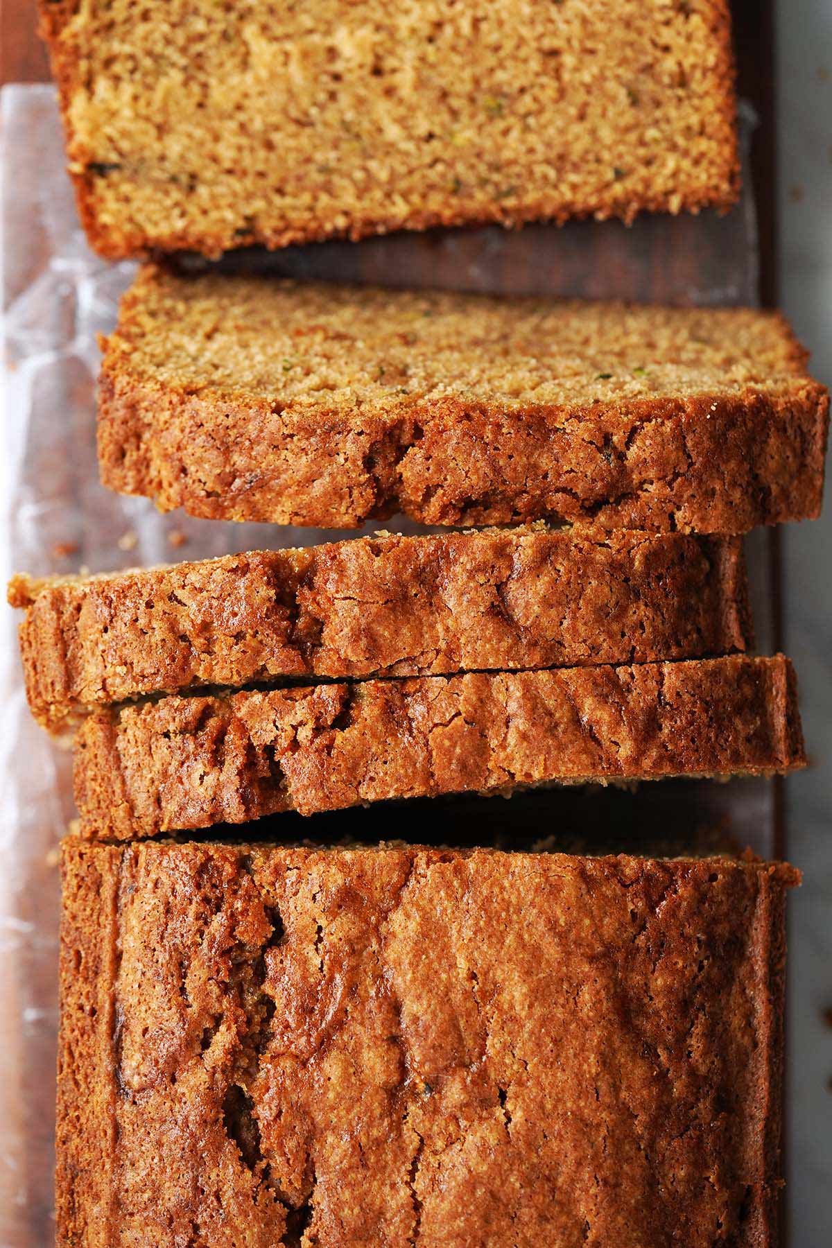 top view of sliced zucchini bread made with sourdough discard cut into slices