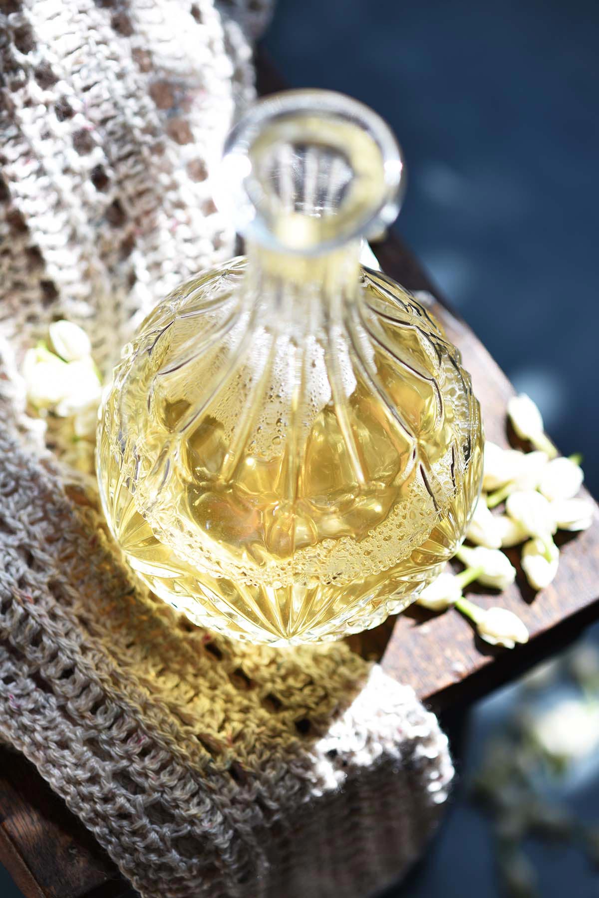 glowing glass jug of jasmine honey miruvor