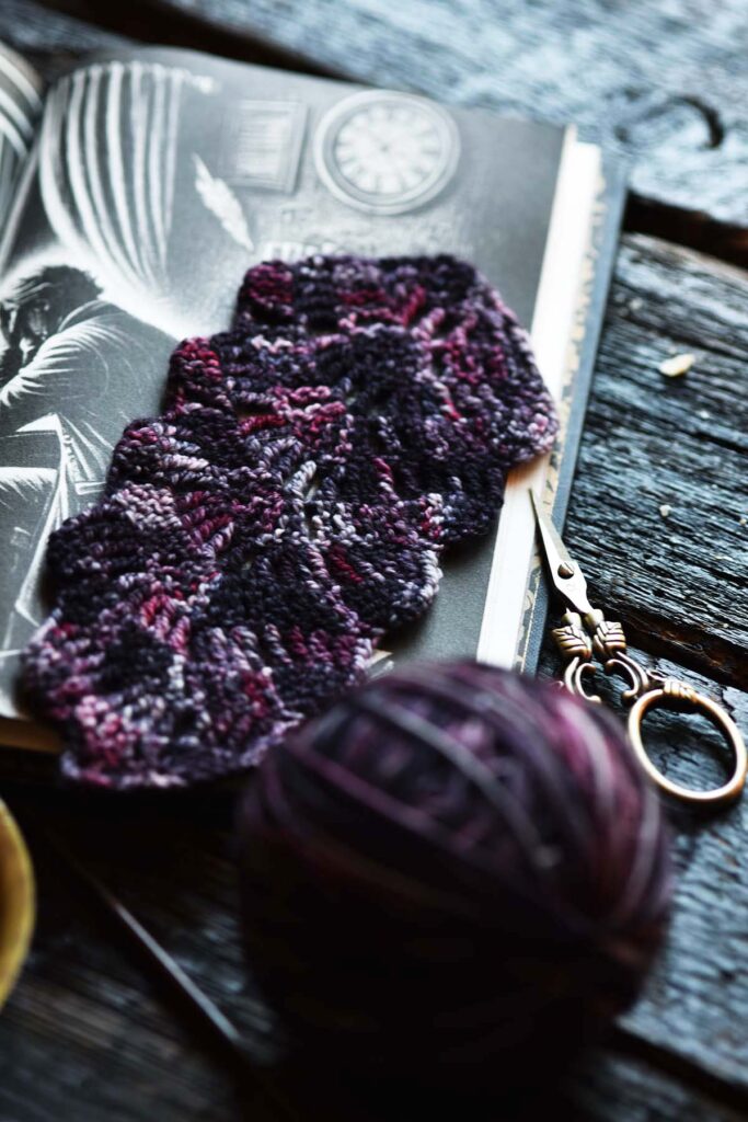 crochet feather bookmark in plumy blackberry wine colors