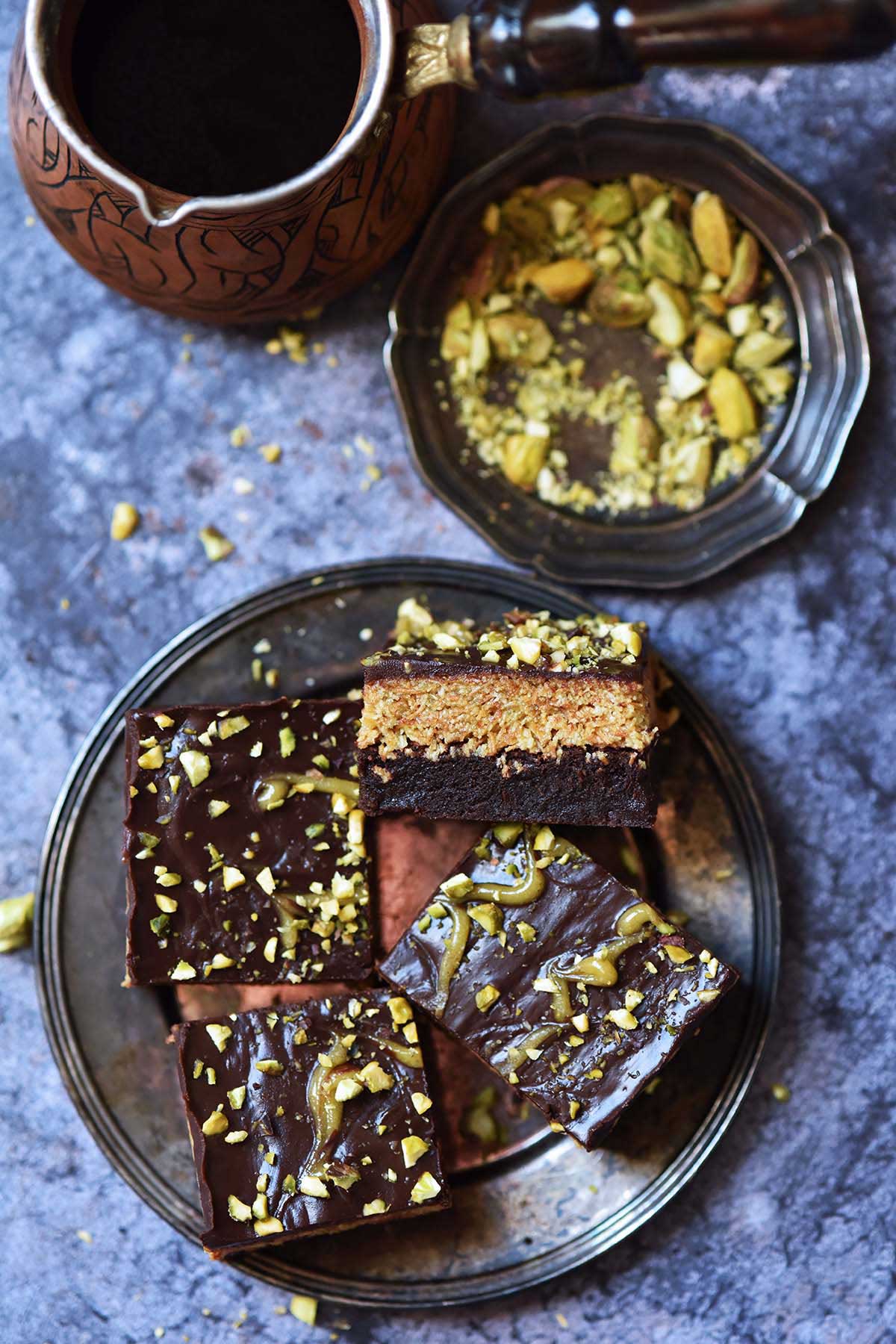 overhead view of Dubai brownies next to pot of Turkish coffee