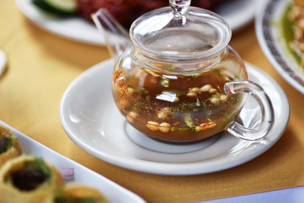 pani puri sauce in small glass pot at DIYA