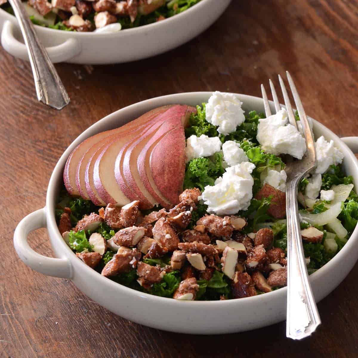 Simple Pear Kale Salad with Candied Almonds and Crumbled Feta An